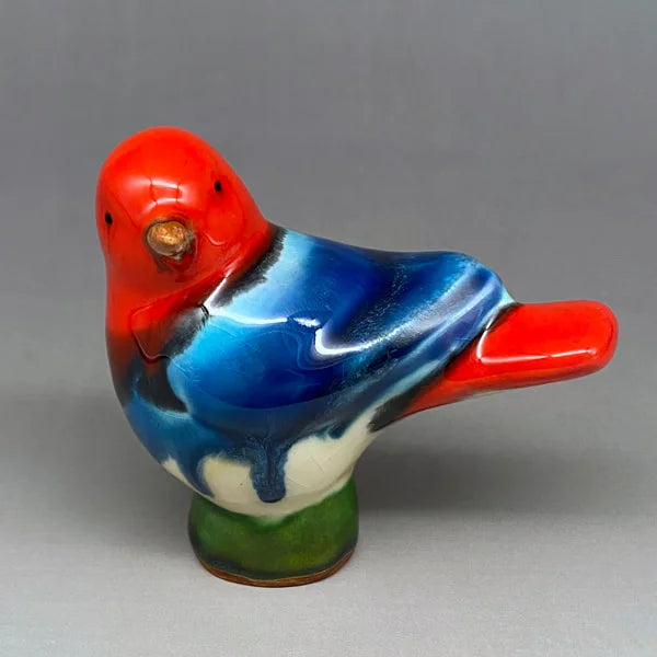 Head-Turned Bird in Azure and Flame